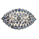 Large sapphire panel brooch of oval or navette form with rectangular cut sapphires and other