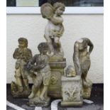 Four modern 'stone' garden figures Condition:
