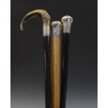 Three early 20th Century silver mounted walking sticks Condition: