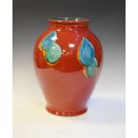 Modern Poole baluster shaped vase having blue and green decoration on a red ground Condition: