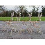 Four wrought metal patio/garden chairs Condition: