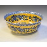 Late 20th Century Chinese porcelain bowl having blue and white decoration depicting dragons on a