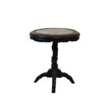 Chinese ebonised circular topped occasional table standing on a turned pillar and quadripartite base