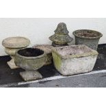 Five various modern 'stone' garden pots, together with a similar ornament Condition: