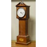 Early 20th Century inlaid mahogany cased mantel clock in the form of a longcase clock, the off-white