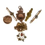 Assortment of gold and yellow metal jewellery to include; three assorted bar brooches, a circular