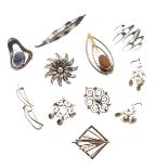 Collection of nine Scandinavian and other modernist silver and white metal brooches, together with a