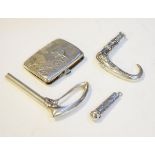 Group of silver and white metal items comprising: Art Nouveau style cigarette case, two walking cane