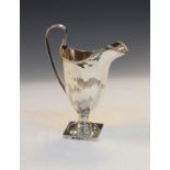 George III cream jug of neo classical helmet form with strap handle, London 1809, 3.7oz approx