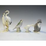 Bing & Grondahl Copenhagen figure of a seated cat, a similar figure of a bird, a Lladro figure of