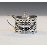 George V oval drum mustard pot with pierced body, hallmarked Chester 1920, 2.5oz approx Condition: