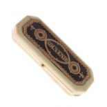 19th Century ivory toothpick case, the hinged cover inset with a gold coloured metal and blue foil