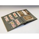 Postcards - Album of mainly early 20th Century postcards Condition: