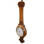 Carved oak framed aneroid barometer and thermometer Condition: