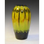 Modern Poole slender ovoid vase having red and black streak decoration on a green ground Condition: