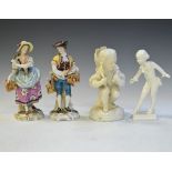 Pair of Samson porcelain figures depicting a gallant and lady and two off-white glazed figures