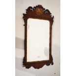 18th Century fret framed walnut wall mirror with gilt shaped cresting and wings (for restoration)