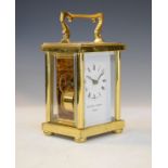 Modern brass cased carriage clock by Matthew Norman, the white dial with Roman numerals Condition: