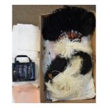 Box of assorted costume and linen to include; ostrich feathers, crocodile effect handbag, crochet