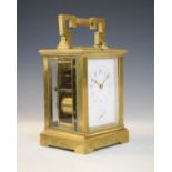 Large French brass cased carriage clock by E. Maurice & Co, having a repeat movement, white enamel