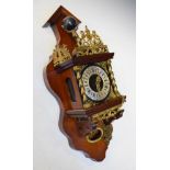 Dutch style reproduction stoelklok wall clock with figure of Atlas and two brass pear weights