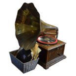 Early 20th Century oak cased table top gramophone with brass sound horn and a selection of records