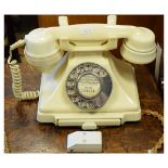Mid 20th Century cream Bakelite telephone with pull out exchange chart Condition: