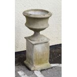 Reconstituted stone garden urn on square pedestal Condition: