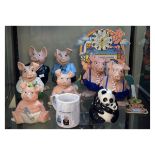 Collection of Wade Nat West piggy banks and related items, together with a Wade Panda money bank