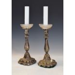 Pair of 19th Century Continental white metal candlesticks now converted to electric table lamps,