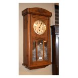 Early 20th Century oak cased three train chiming wall clock Condition: