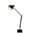 Mid century design - a black painted anglepoise table lamp, the single upper arm on three supports