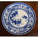Chinese export circular plate having blue and white painted decoration depicting a procession of