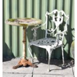 Marble top circular garden table on white painted iron pedestal and tripod base, together with a