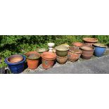 Selection of modern terracotta and other pottery garden planters, approximately eighteen in total