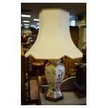 Modern table lamp of hexagonal baluster form decorated with Chinese style blossom, beneath hexagonal