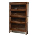 Early 20th Century Globe Wernicke oak four section modular bookcase with glazed up-and-over doors
