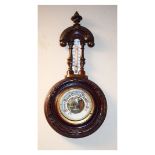 Early 20th Century carved beech framed aneroid barometer and thermometer, the off-white dial with