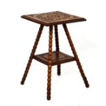 Early 20th Century carved oak square top two tier occasional table, standing on bobbin turned