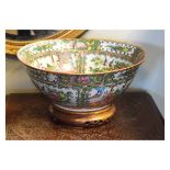 20th Century Cantonese Famille Rose bowl typically decorated with figures on a terrace and floral