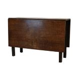 George III oak drop-leaf gate-leg dining table having rectangular flaps on square section supports