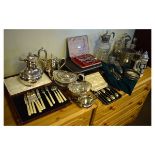 Selection of silver plated wares to include; claret jug, three bottle decanter stand, three piece