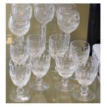 Eight Waterford cut crystal Colleenhock pattern hock glasses, together with eight matching white