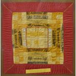 Framed miniature patchwork quilt worked by Boer prisoners while in Ceylon during the South Africa