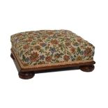 Victorian walnut framed footstool with floral tapestry cover on four bun feet Condition:
