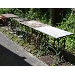 Four assorted garden tables, each with cast iron sewing machine base and associated rectangular