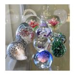 Small collection of modern glass paperweights Condition: