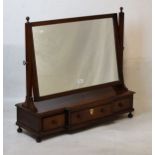 19th Century mahogany swing dressing mirror, the rectangular plate within ebony strung borders and