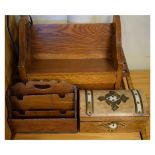 Early 20th Century oak book rack with drawer beneath flanked by pipe racks; a walnut three