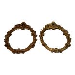 Pair of French style gilt framed wall mirrors, each with foliate scroll surround Condition: